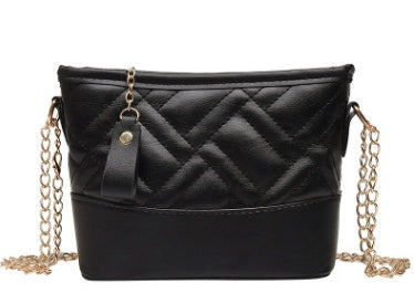 Inclined shoulder bag