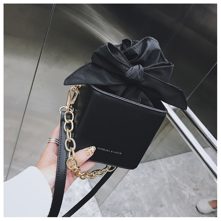 Folded flower square bag