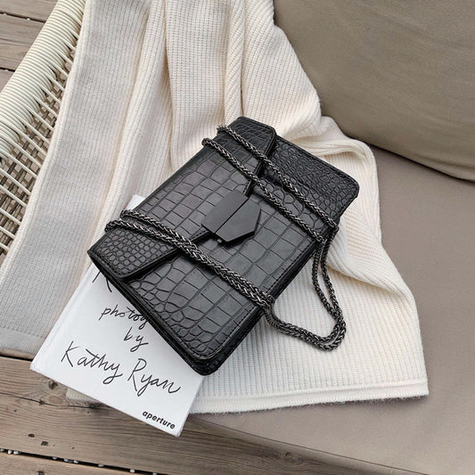 Inclined shoulder bag
