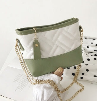 Inclined shoulder bag