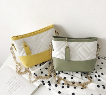 Inclined shoulder bag